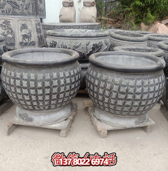 自然美學(xué)結(jié)合青石石雕、浮雕、編織、雕塑的戶外園林魚(yú)缸